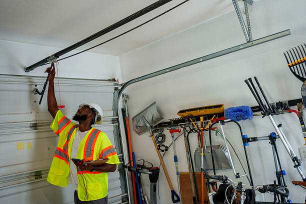 Professional Garage Door Panel Replacement technician working in Tularosa, NM